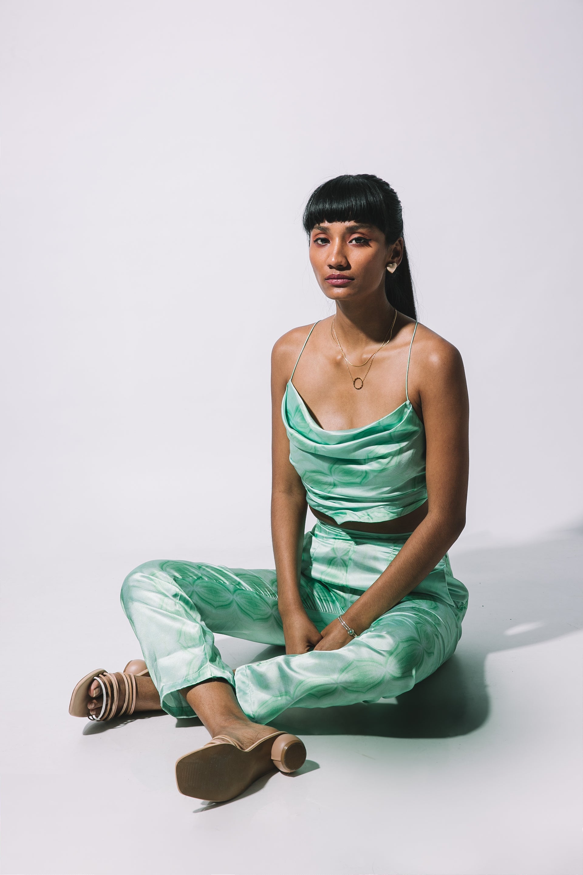 Priyanka Nazareth In Our Green Satin Cowl Set.