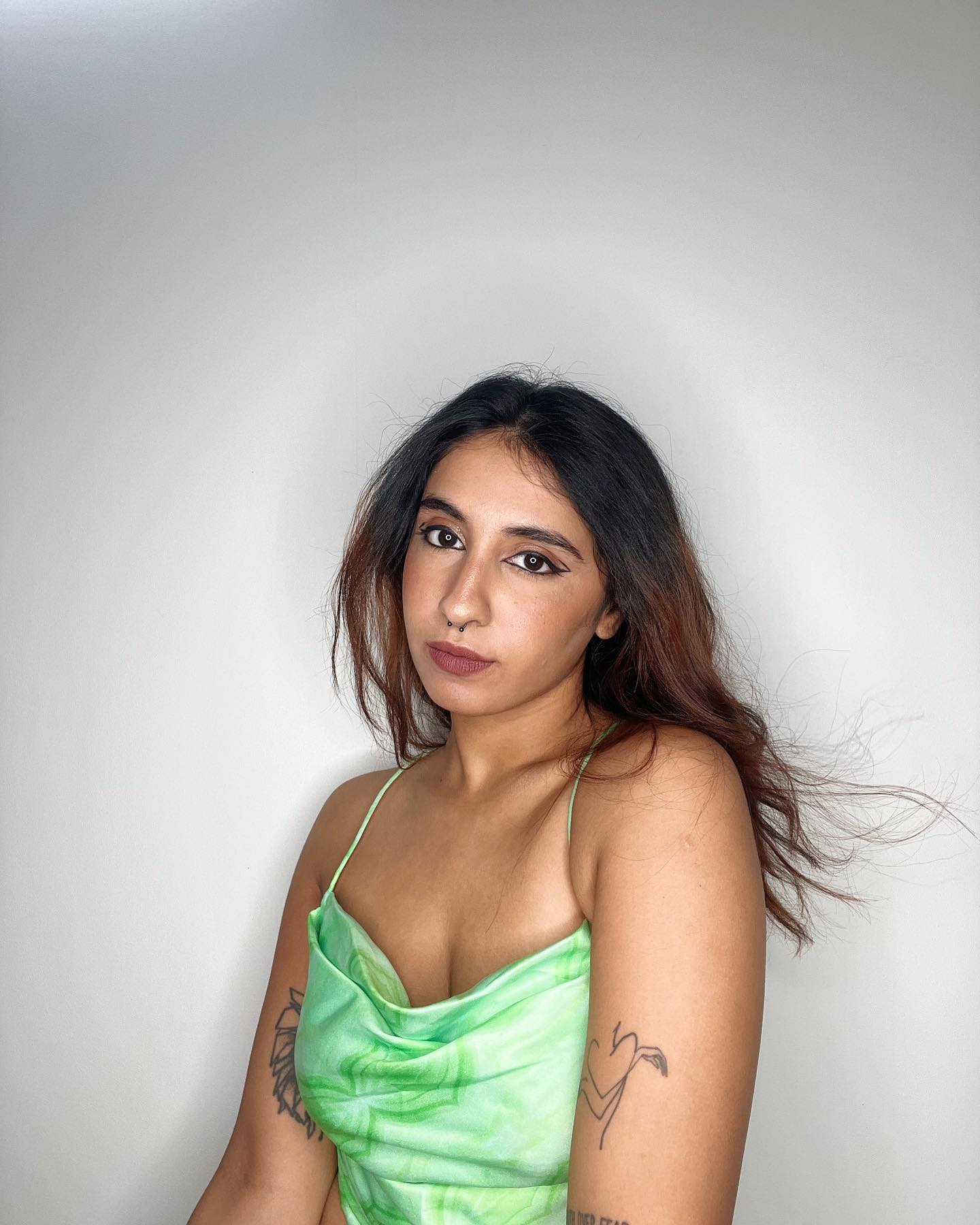 Priyanka Nazareth In Our Green Satin Cowl Set.